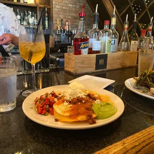 two plates of food on a bar