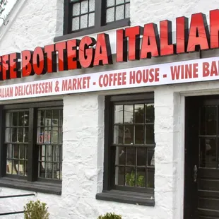 a white building with black windows