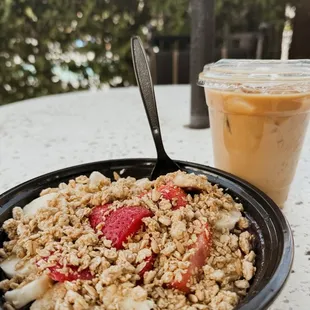 Acai bowl with strawberries,banana,and granola. Iced Vanilla Latte with extra shot of expresso