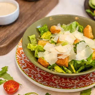 A traditional Caesar salad  but with our special caffe Caesar dressing!