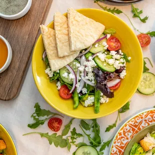 Greek salad with our signature Greek dressing and pita bread