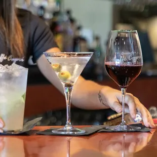a woman sitting at a bar
