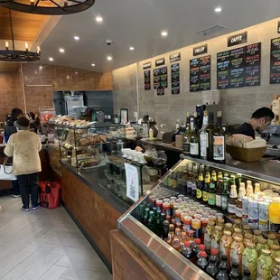 customers at the counter of a cafe