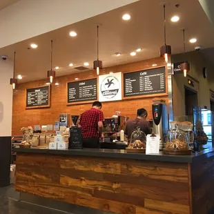 Located through the library front doors and immediately to the right, past the elevators.