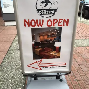 Love a good cafe in the library. Lead the way sign.