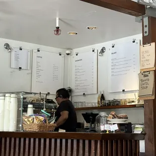 Menu with barista making my drink