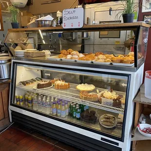 a display of pastries and desserts