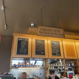 two men sitting at a counter