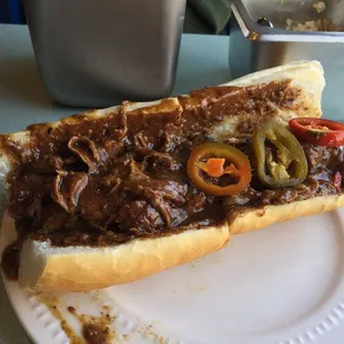 Roast beef on long roll with sharp provolone and cherry peppers.  This is the best hot roast beef I&apos;ve ever had, I&apos;m serious