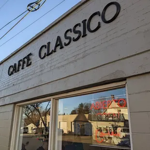 the reflection of the building across the street