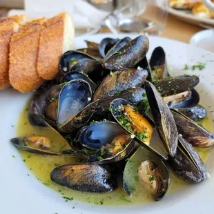 The freshest mussels in a white wine butter broth.