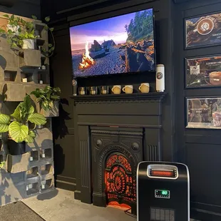 a tv on a fireplace