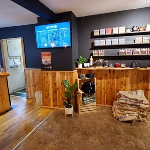 a coffee shop with wooden walls