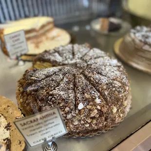 a variety of cakes on display