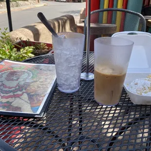 Double espresso on ice with half and half and Mexican wedding cookies