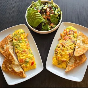 Omelette with sourdough toast with avocado salad