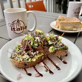 Little Italy toast in the forefront and Egg Panini in the background. So delicious!