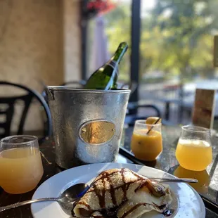 Delicious crepe &amp; bottle of champagne with fresh squeezed orange juice!