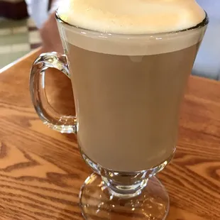 a cup of coffee on a table