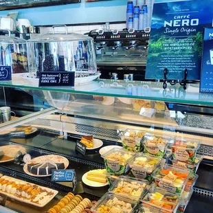 Some selection of food beside the cashier