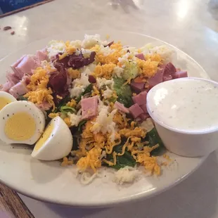 Chef salad, no tomatoes or olives, 1/2 Swiss cheese 1/2 cheddar.  Homemade ranch.