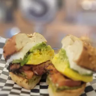 two sandwiches on a checkered plate