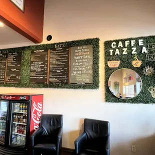 Menu board is on the wall. Pretty easy read.
