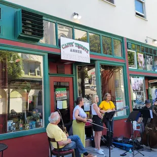 Musicians performing outside the annex