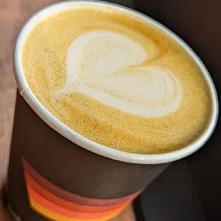 Goldenmilk latte with turmeric, oat milk, etc