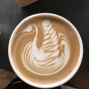 Coffee, latte art with a swan