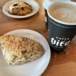 Blueberry scone, savory cheese full scone, small chai, large oat milk latte