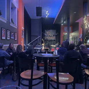 a group of people sitting at a table
