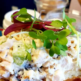 Chicken salad bagel with greens