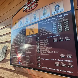 a menu on the outside of a restaurant