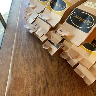 a stack of coffee bags on a table