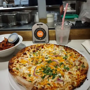 KCQUE pizza