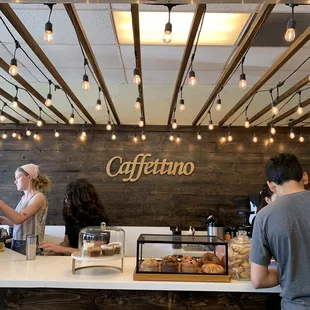 a man and a woman at a counter