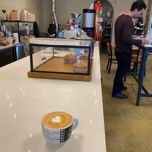 a cup of coffee on a counter