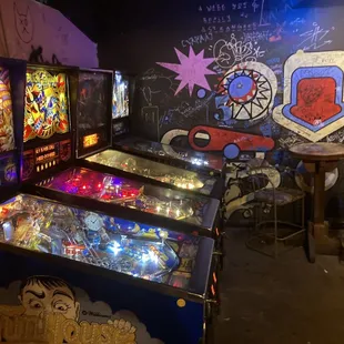 a row of pinball machines