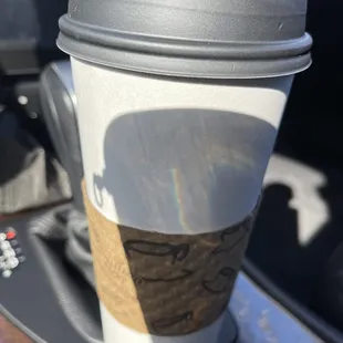 a coffee cup in a cup holder