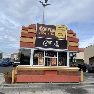 a coffee shop on a street corner