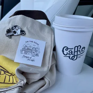 My Caffioso and super cute enamel pin of the Vespacar espresso bar! Added to my fledging pin collection on my market bag!