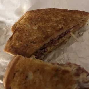 Pastrami Sandwich with Swiss cheese on rye toasted bread