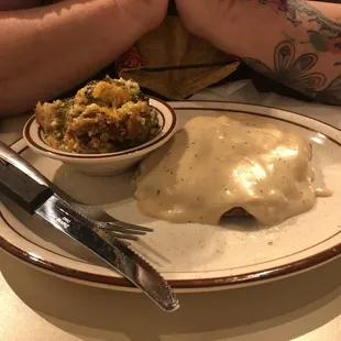 Chicken fried steak with a side of broccoli casserole.