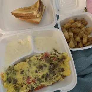 Farmers omelet with sides of grits/home fries/toast