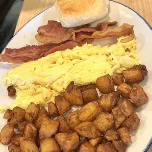 Eggs bacon home fries biscuit