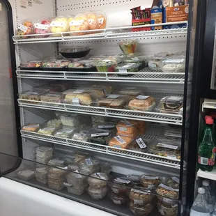 Deli case with staples like homemade chicken salad, tuna salad, pimento cheese, sandwiches and more.