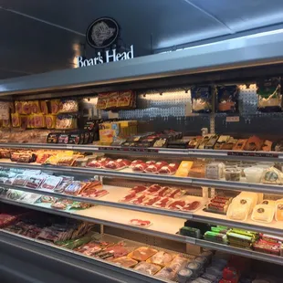 a display of meat and cheeses