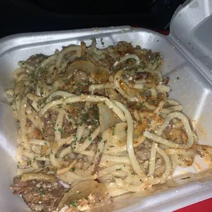 a tray of pasta with meat and cheese