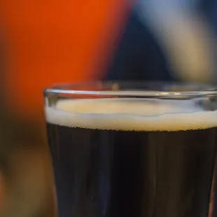 a closeup of a glass of beer